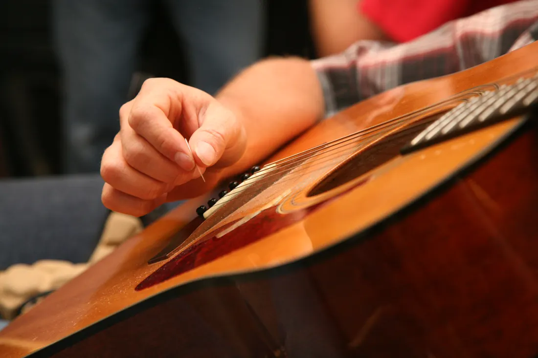 A flamenco guitarist accompanying a performance